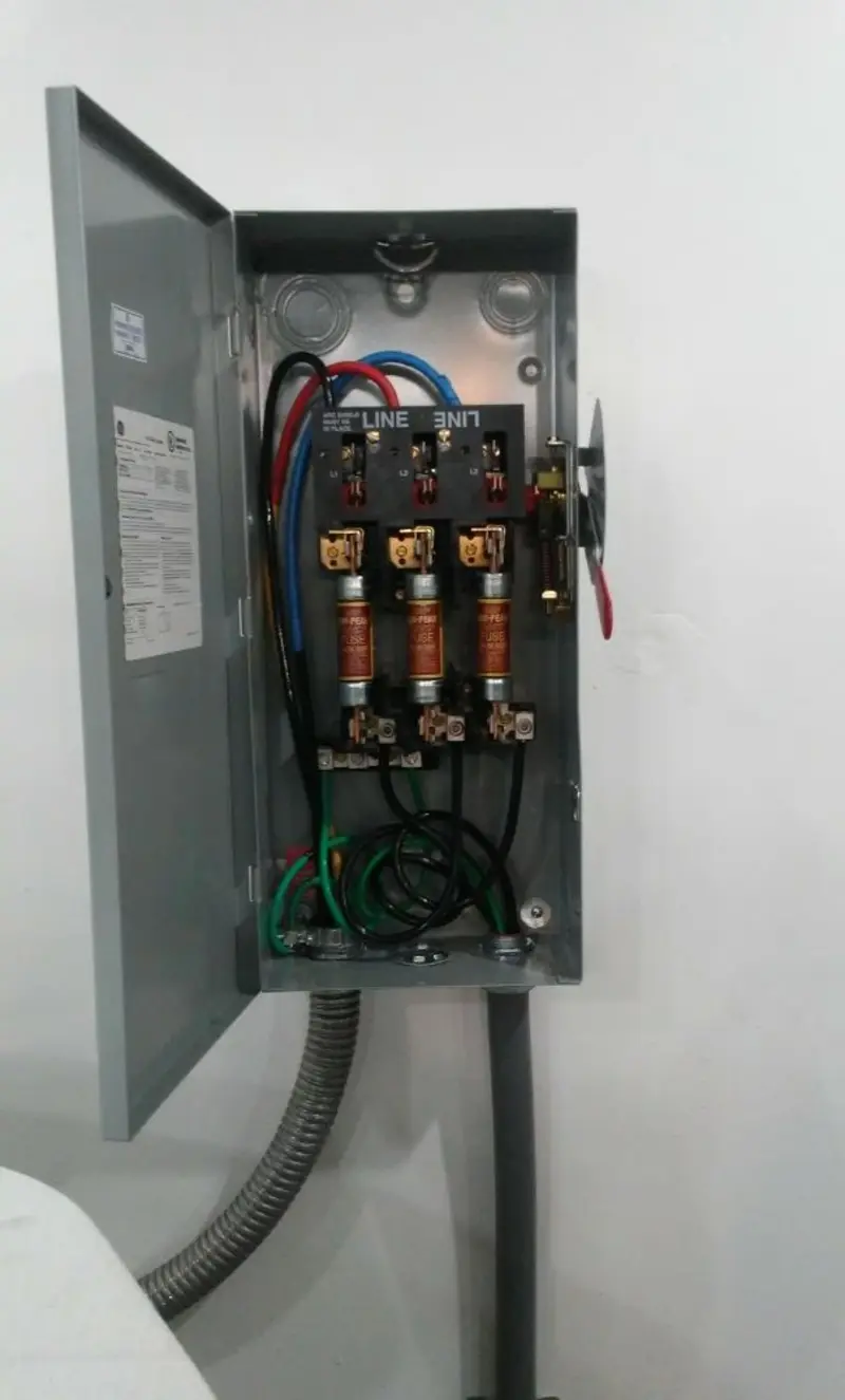 Three-phase disconnect switch installed for Smoke Detector Installation in Champion